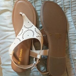 Tan sandals with white leather strap